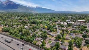 Aerial view of residential area featuring mountains