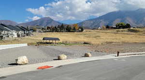 View of mountain backdrop with nearby suburban area