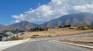 Mountain view featuring nearby suburban area