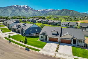 Aerial perspective of suburban area featuring mountains