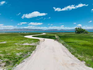Surrounding community featuring a mountain view and a view of rural / pastoral area