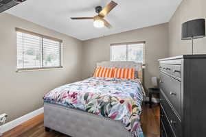 Bedroom with wood finished floors and ceiling fan