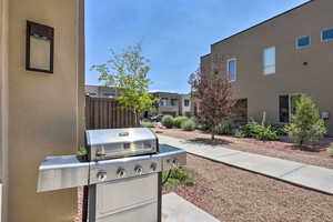View of patio / terrace featuring grilling area and a residential view
