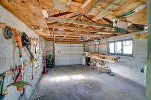 Garage featuring a garage door opener