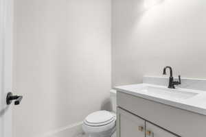 Bathroom with vanity and toilet