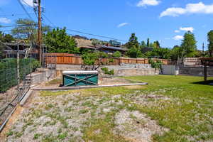 View of fenced backyard