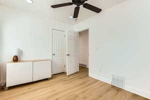Unfurnished bedroom featuring light wood-style flooring, recessed lighting, and ceiling fan