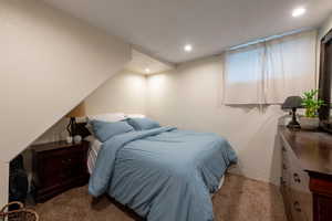 Bedroom with carpet and recessed lighting