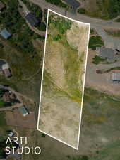 Aerial overview of property's location featuring property parcel outlined