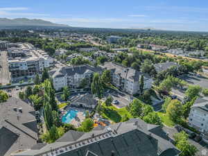Aerial view of a mountainous background and a pool