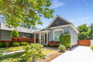 View of front of house with board and batten siding