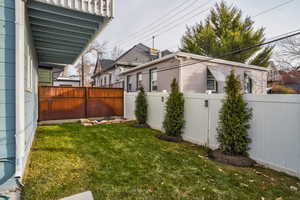 View of fenced backyard