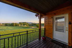 Front entery door featuring a mountain view