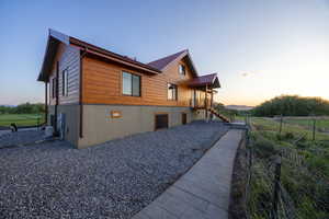 View of property exterior at dusk