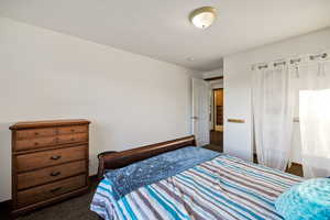 Bedroom with carpet 1/5