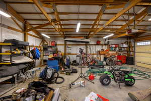 Garage featuring a garage door opener