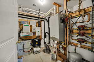 Utility room with tankless water heater