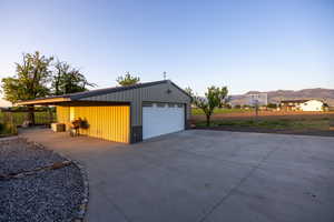 Detached garage with a mountain view