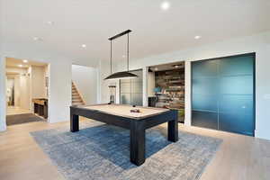 Recreation room featuring billiards table, light wood-type flooring, and recessed lighting