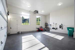 Garage featuring water heater