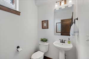 Half bathroom featuring toilet