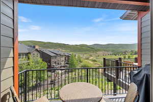 Balcony featuring a grill and a mountain view