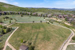 View of property location with nearby suburban area and a mountainous background