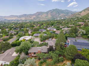 Aerial view of residential area with a mountainous background