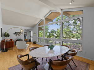 Dining area featuring plenty of natural light and light wood-type flooring