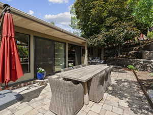 View of patio featuring outdoor dining area