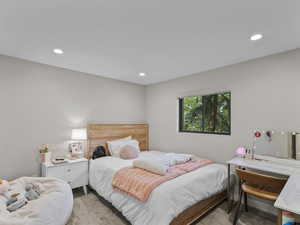 Carpeted bedroom featuring recessed lighting