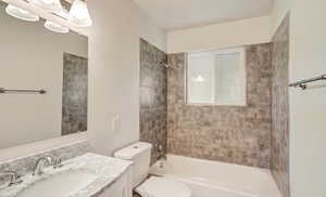 Full bathroom with vanity and shower / washtub combination