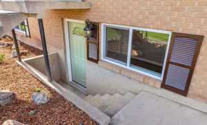 Property entrance with brick siding