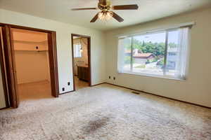 Primary Bedroom with large walk-in closet and 3/4 bath