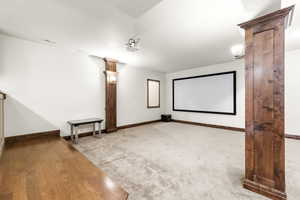 Carpeted cinema with baseboards