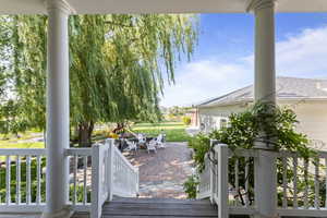 Wooden terrace with a patio area