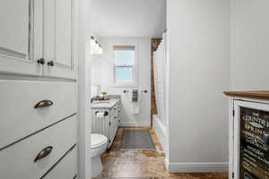 Bathroom featuring vanity and a textured ceiling