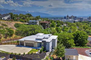 View of subject property with a mountain backdrop