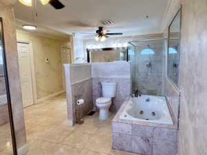Bathroom with a ceiling fan, a tub with jets, crown molding, tiled shower, and tile patterned floors