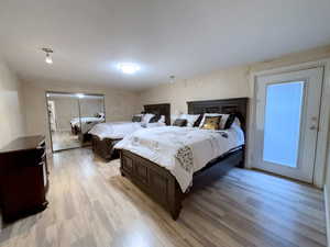 Bedroom with light wood-style flooring