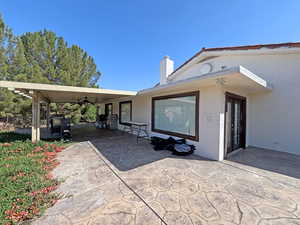 View of patio / terrace featuring ceiling fan and french doors