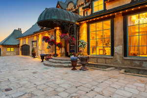 View of patio / terrace featuring an attached garage