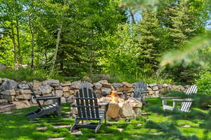 View of yard with a fire pit