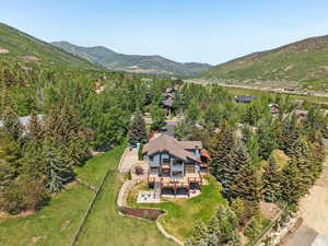 View of subject property with mountains