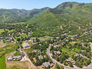 Aerial view of residential area featuring a mountain backdrop
