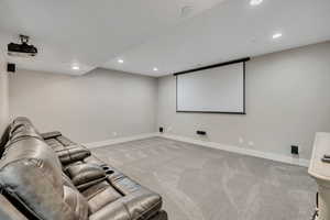 Cinema with carpet and recessed lighting