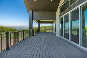 Wooden deck featuring a mountain view