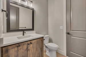 Bathroom with toilet and vanity