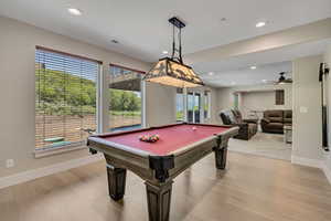 Recreation room featuring light wood-style flooring, pool table, recessed lighting, and a ceiling fan