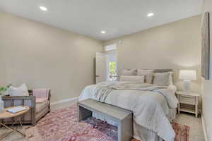 Primary bedroom with walk-in closet
